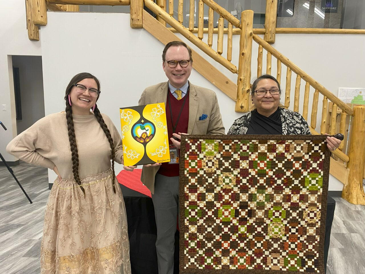 Gift Exchange at Signing Ceremony

Gift Exchange, on (left) Grace Swain Indigenous artist and Communications and Media Specialist for the Maamwesying Ontario Health Team, (middle) Tim Vine, President and CEO of NSHN, (right) Carol Eshkakogan, CEO of Maamwesying North Shore Community Health Services Inc./Chair of the Maamwesying Ontario Health Team Leadership Council

