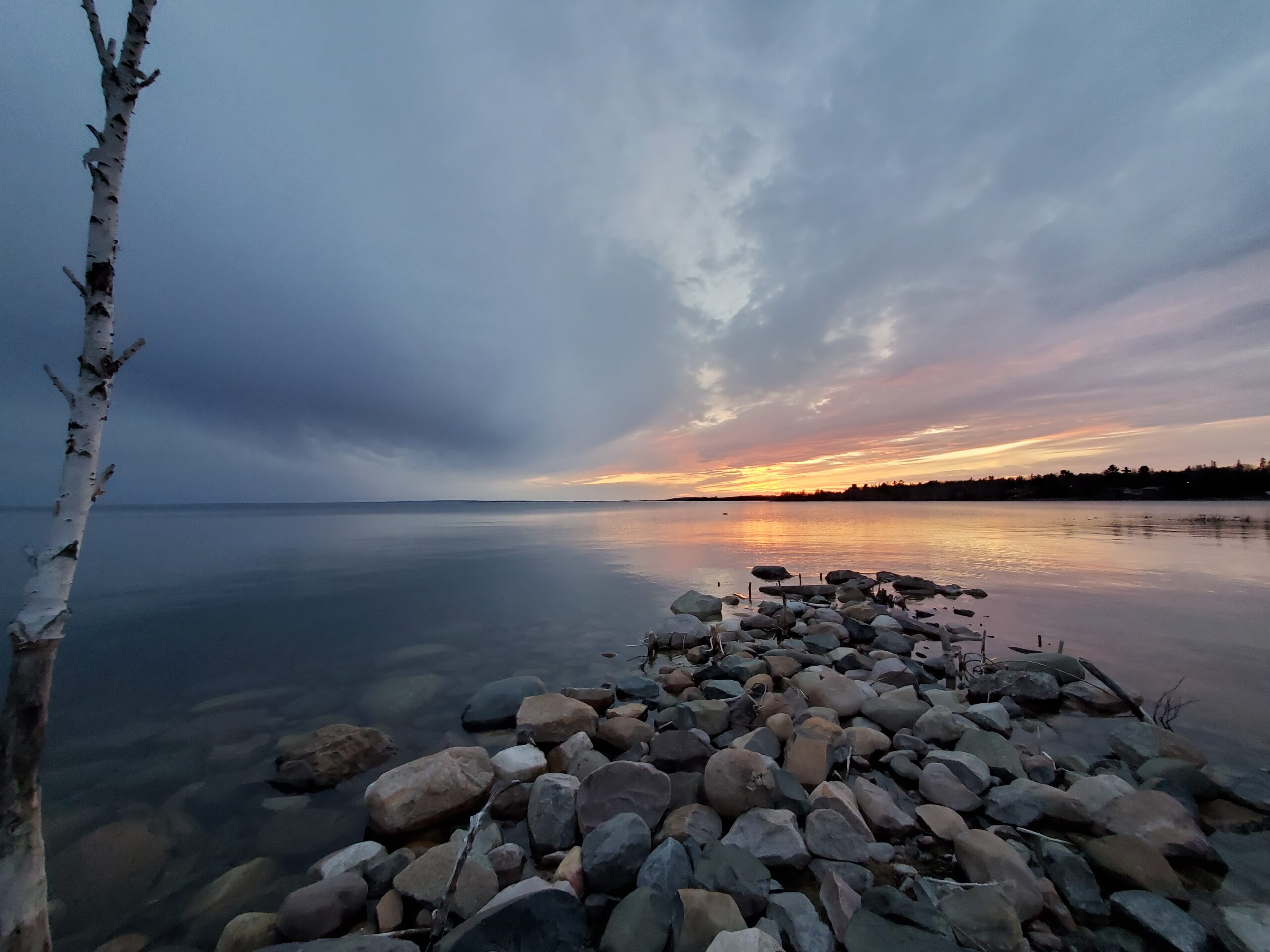 Photo of the sunset over the water